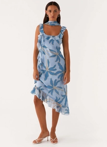 Detail of light blue floral chiffon dress featuring ruffled neckline and matching neckpiece