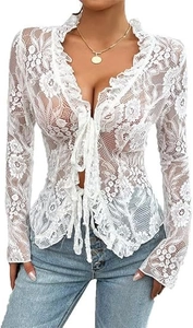 Detailed view of white floral lace cardigan with ruffle trim and front tie closure