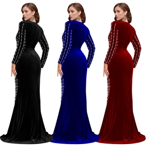 Velvet evening gowns in black, blue, and wine red with elegant pearl fringe details