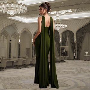 Detail of elegant emerald green satin backless maxi dress with long ribbon necktie