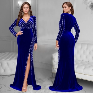 Elegant royal blue velvet evening gown with deep V-neck, long sleeves and crystal beadwork