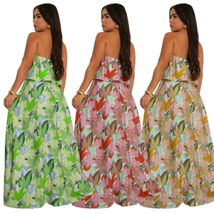 Detail of multi-color tropical print maxi dress with strapless layered design