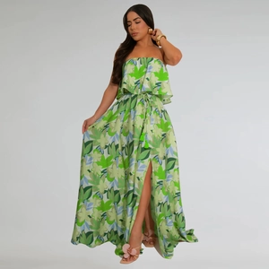 Detail view of floral tube top maxi dress featuring high slit and drawstring waist