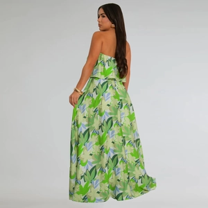 Detail view of backless floral print strapless maxi dress with tropical leaf patterns