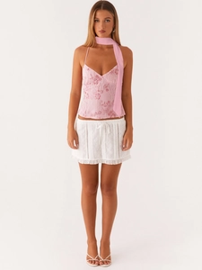 Pink floral embroidered camisole set with neck scarf and white eyelet mini skirt