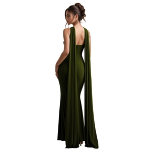 Detail of dark green evening dress featuring an elegant backless cut and flowing shoulder ribbons