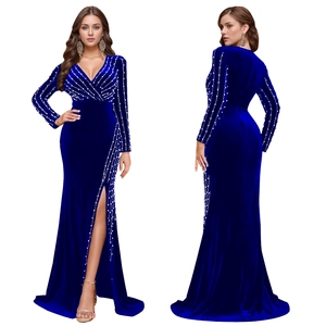 Detail of navy blue velvet evening gown with V-neckline and radial pearl embroidery