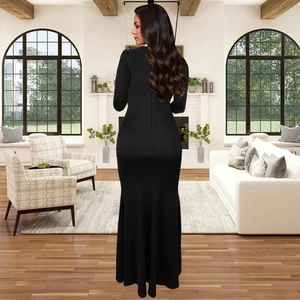 Détail d'une robe sirène noire élégante à manches longues avec silhouette longue sol