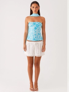 Floral embroidered light blue tube top with matching scarf and white eyelet skirt