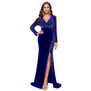 Detailed view of silver beads and hot-fix rhinestones on deep blue velvet slit dress