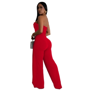 Side view of red strapless wide-leg jumpsuit with high waist and backless design