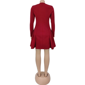 Back view of elegant red long-sleeved mini dress with ruffled pleated skirt design