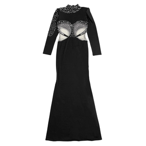 Close-up of semi-high collar with white pearls on a black sheer mesh evening dress