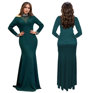 Detail of elegant dark green evening dress with rhinestones and mesh neckline