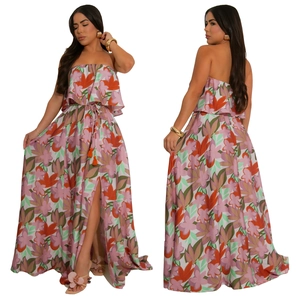 Detailed view of women's floral crop top and high slit skirt with orange tassel drawstrings