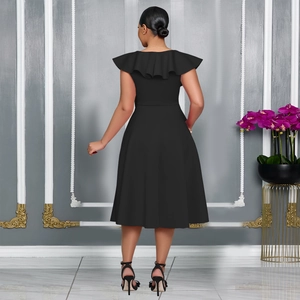 Close-up of elegant ruffled back cape detail on a sleeveless black A-line banquet dress