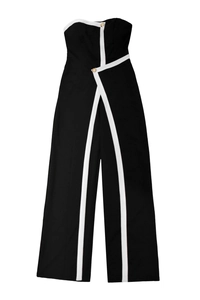Detail of strapless wide-leg jumpsuit with white contrast piping and gold buttons