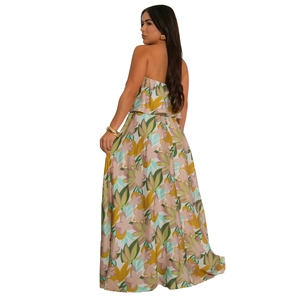 Detailed back view of sleeveless floral maxi dress with vibrant ruffles and front slit