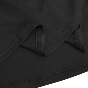 Detail view of neatly stitched hem and pleated texture on this elegant black maxi dress