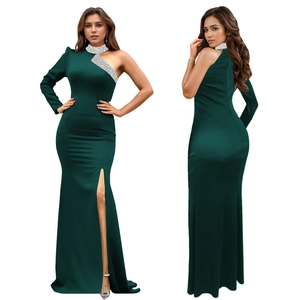 Deep green off-shoulder dress with sparkling silver sequins and high side slit detail