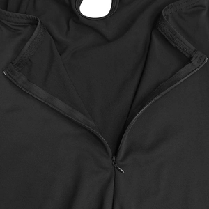 Detail of hidden zipper and fabric texture on a black elegant solid long dress