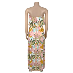 Detail view of tropical floral print and ruffle back design on sleeveless maxi dress