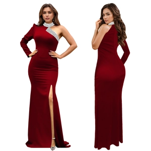 Detail view showing elegant side slit and rhinestones on the wine red evening gown