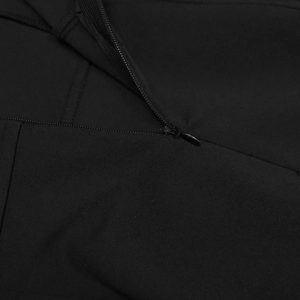 Macro detail of high-quality black invisible zipper on tight woven jumpsuit fabric