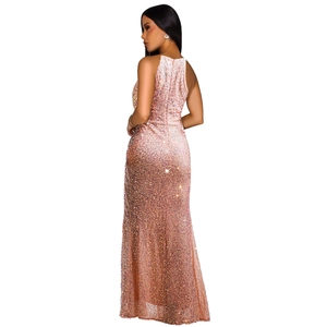 Detail of elegant sequined evening gown in rose gold showing shimmering fabric texture