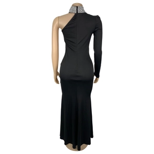 Detail view of the high neck with silver rhinestones and back invisible zipper on black dress