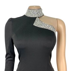 Detail of rhinestone trim on high-neck one-shoulder black formal evening dress