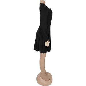 Detail view of the elegant V-neck black long sleeve dress with ruffled hem and waist contour