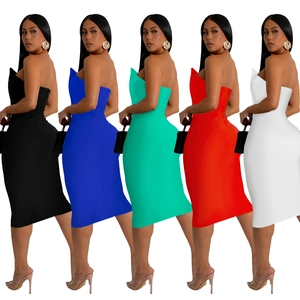 Detail view of slim fit strapless midi dresses available in five vibrant color options