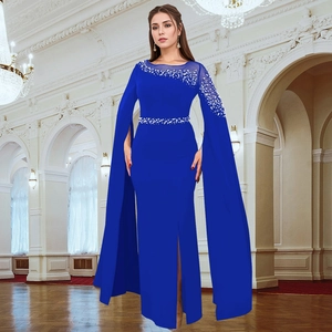 Detail of royal blue evening gown with cape sleeves and crystal beaded neckline