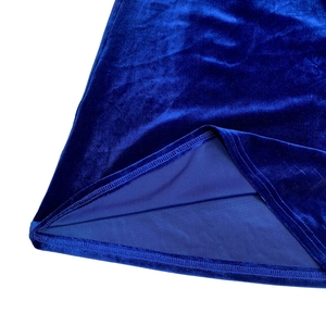 Detailed close-up of royal blue velvet dress stitching and premium lining texture