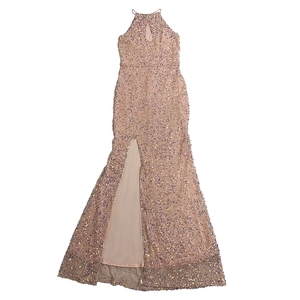 Detailed view of pink sequin evening gown showing halter neckline and side leg slit