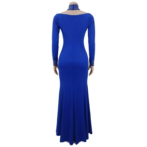 Detail of royal blue evening dress showing rhinestone trim on neck and sleeve cuffs