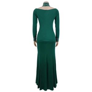 Detail of elegant dark green dress back with rhinestone collar and invisible zipper