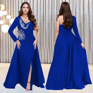 Detail of royal blue evening gown with silver bead embroidery and side high slit