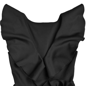 Detail of elegant black dress showing V-neckline and layered ruffle shoulder texture