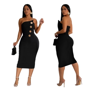 Detail of black bodycon midi dress featuring asymmetric strapless neck and gold buttons
