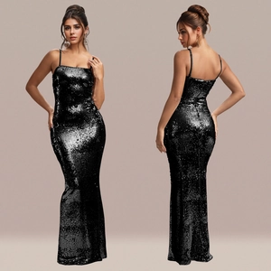 Detail of elegant black sequin evening gown showing slim fit design and back view