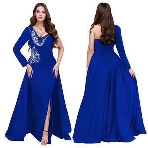 Detail of royal blue v-neck evening gown with silver rhinestone embroidery and side slit