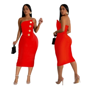 Detail of red tube top midi dress with large gold embossed buttons and slim fit cut