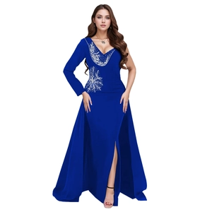 Close-up of elegant V-neckline with silver sequin embroidery on royal blue gown