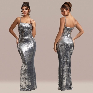 Sparkling silver sequin evening gown with thin straps and a slim fit mermaid silhouette