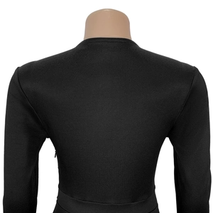 Detail view of black rhinestone dress back with fine knitted texture and slim fit design