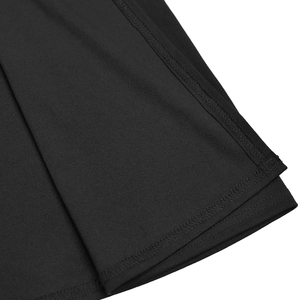Detailed view of precision overlock stitching on the hem of a black evening gown dress