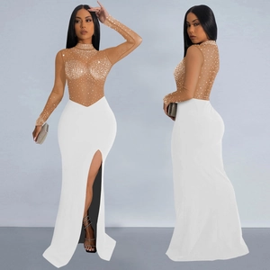 Detail of sheer mesh bodice with rhinestones and white high slit evening dress