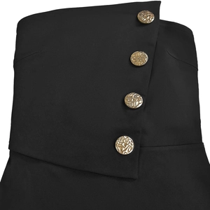 Detailed macro view of the diagonal front placket with four embossed gold metal buttons